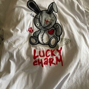 White Graphic Tee with Lucky Charm Design